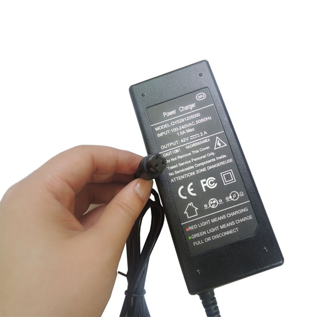 elektrikli-kaykay-sarj-adaptoru-42v-2a-universal-cincir__0245864238385550.jpg